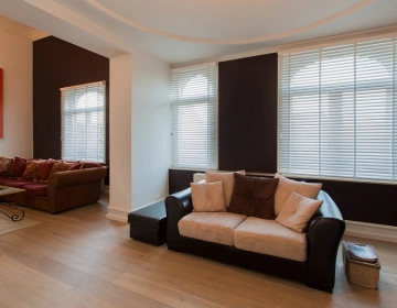 Stores en bois de Van Eyck Shutters