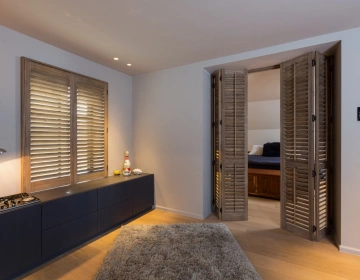 Houten shutters als roomdivider